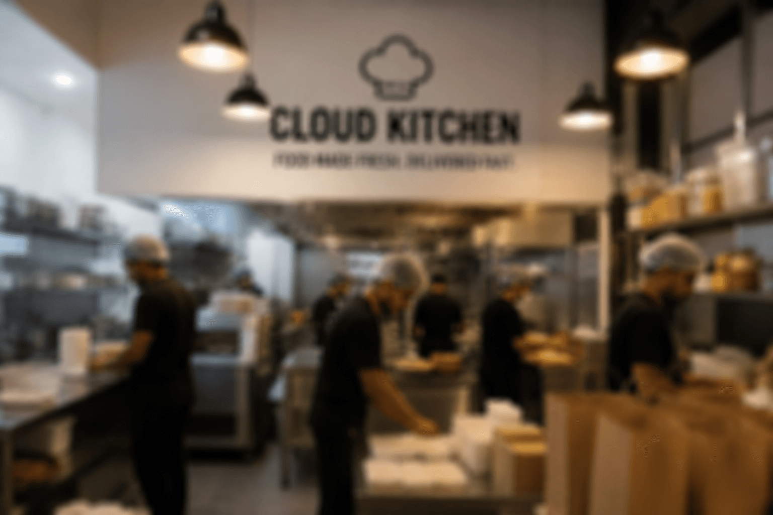 Cloud kitchen team preparing food orders
